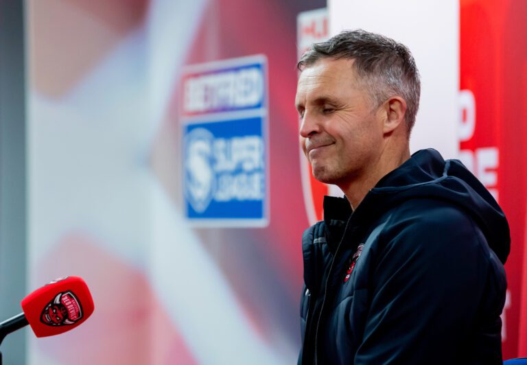 Picture by Allan McKenzie/SWpix.com - 27/02/2025 - Rugby League - Betfred Super League Round 3 - Hull KR v Salford Red Devils - Sewell Group Craven Park, Hull, England - Salford coach PauL Rowley dejected during his interviewed post match after defeat to Hull KR.