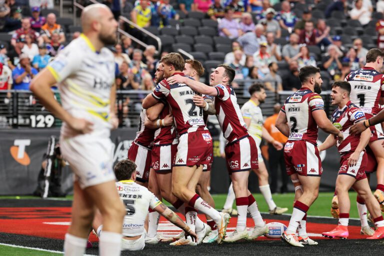 Picture by Alex Whitehead/SWpix.com - 01/03/2025 - Rugby League Las Vegas - Betfred Super League Round 3 - Wigan Warriors v Warrington Wolves - Allegiant Stadium, Las Vegas, USA - Luke Thompson of Wigan celebrating his try with teammates