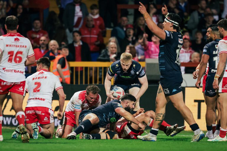 Picture by Alex Whitehead/SWpix.com - 11/04/2025 - Rugby League - Betfred Super League: Round 7 - Hull KR vs Wigan Warriors - Sewell Group Craven Park, Hull, England - Tyler Dupree of Wigan celebrates after Abbas Miski scores a try.