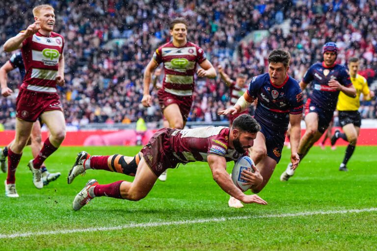 Picture by Olly Hassell/SWpix.com - 18/04/2025 - Rugby League - Betfred Super League Round 8 - Wigan Warriors v St Helens - The Brick Community Stadium, Wigan, England - Abbas Miski of Wigan scoring a try