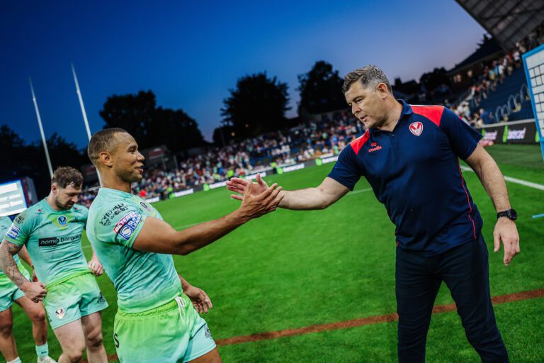 Picture by Alex Whitehead/SWpix.com - 11/07/2025 - Rugby League - Betfred Super League: Round 18 - Leeds Rhinos vs St Helens - AMT Headingley, Leeds, England - St Helens head coach Paul Wellens and Moses Mbye celebrate the win