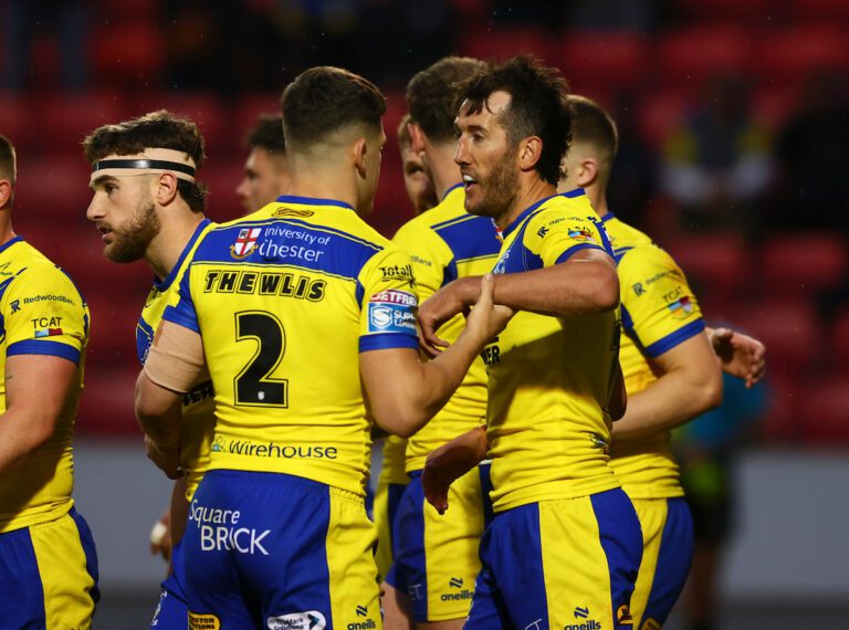 Picture by Paul Currie/SWpix.com - 04/07/2025 - Rugby League - Betfred Super League Round 17 - Salford Red Devils v Warrington Wolves - Salford Community Stadium, Eccles, England - Warrington Wolves' Stefan Ratchford celebrates scoring a try