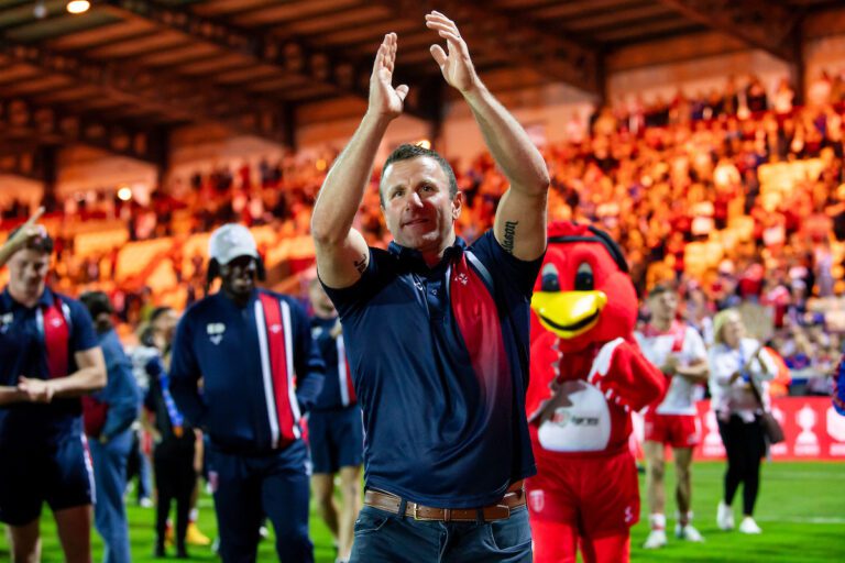 Picture by Allan McKenzie/SWpix.com - 18/09/2025 - Rugby League - Betfred Super League Round 27 - Hull KR v Warrington Wolves - Sewell Group Craven Park, Hull, England - Hull KR's coach Willie Peters thanks the fans and supporters after his side win the Betfred Super League leaders trophy.