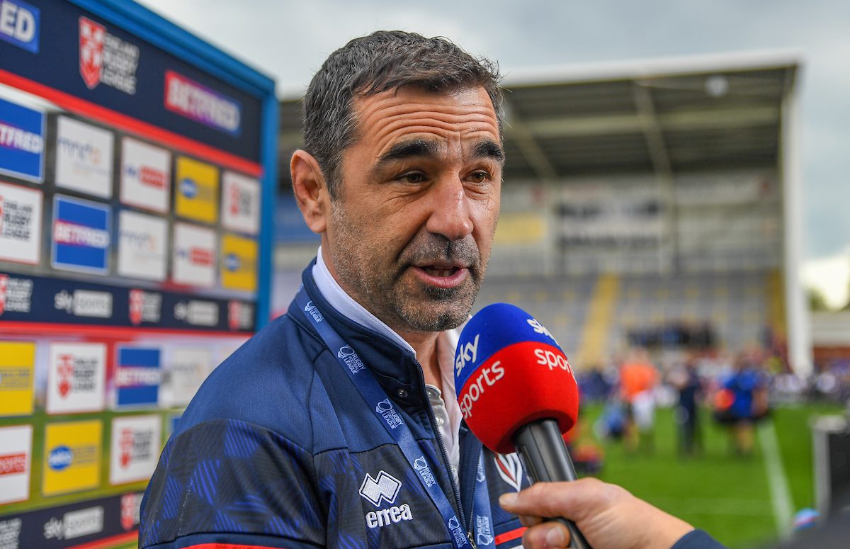 Picture by Olly Hassell/SWpix.com - 29/04/2023 - Rugby League - Rugby League Mid-Season International - England Men v France Men - Halliwell Jones Stadium, Warrington, England - amie Jones Buchanan interviews France Men's Rugby League Head Coach Laurent Frayssinous before kick off