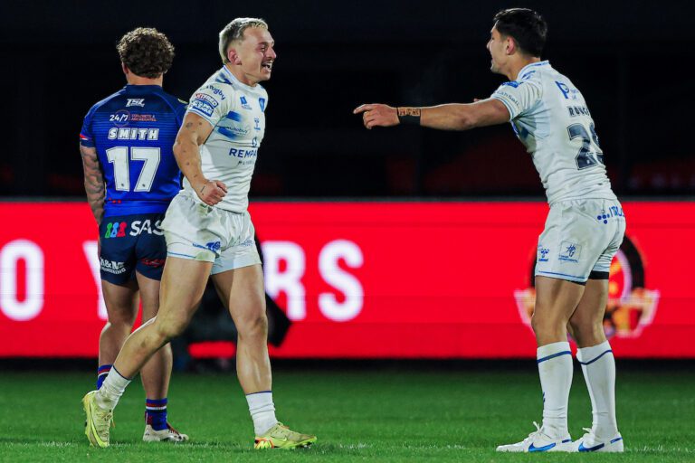 Picture by Alex Whitehead/SWpix.com - 14/02/2026 - Rugby League - Betfred Super League: Round 1 - Wakefield Trinity vs Toulouse Olympique - The DIY Kitchens Stadium, Wakefield, England - Olly Ashall-Bott of Toulouse celebrates the win with Cesar Rouge.
