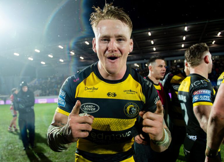 Harris hurts hammy in half-century win