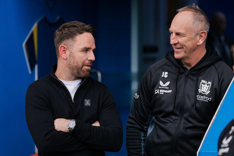 Picture by Alex Whitehead/SWpix.com - 12/04/2025 - Rugby League - Betfred Super League: Round 7 - Warrington Wolves vs Hull FC - Halliwell Jones Stadium, Warrington, England - Hull FC head coach John Cartwright (right) and CEO Richie Myler (left)